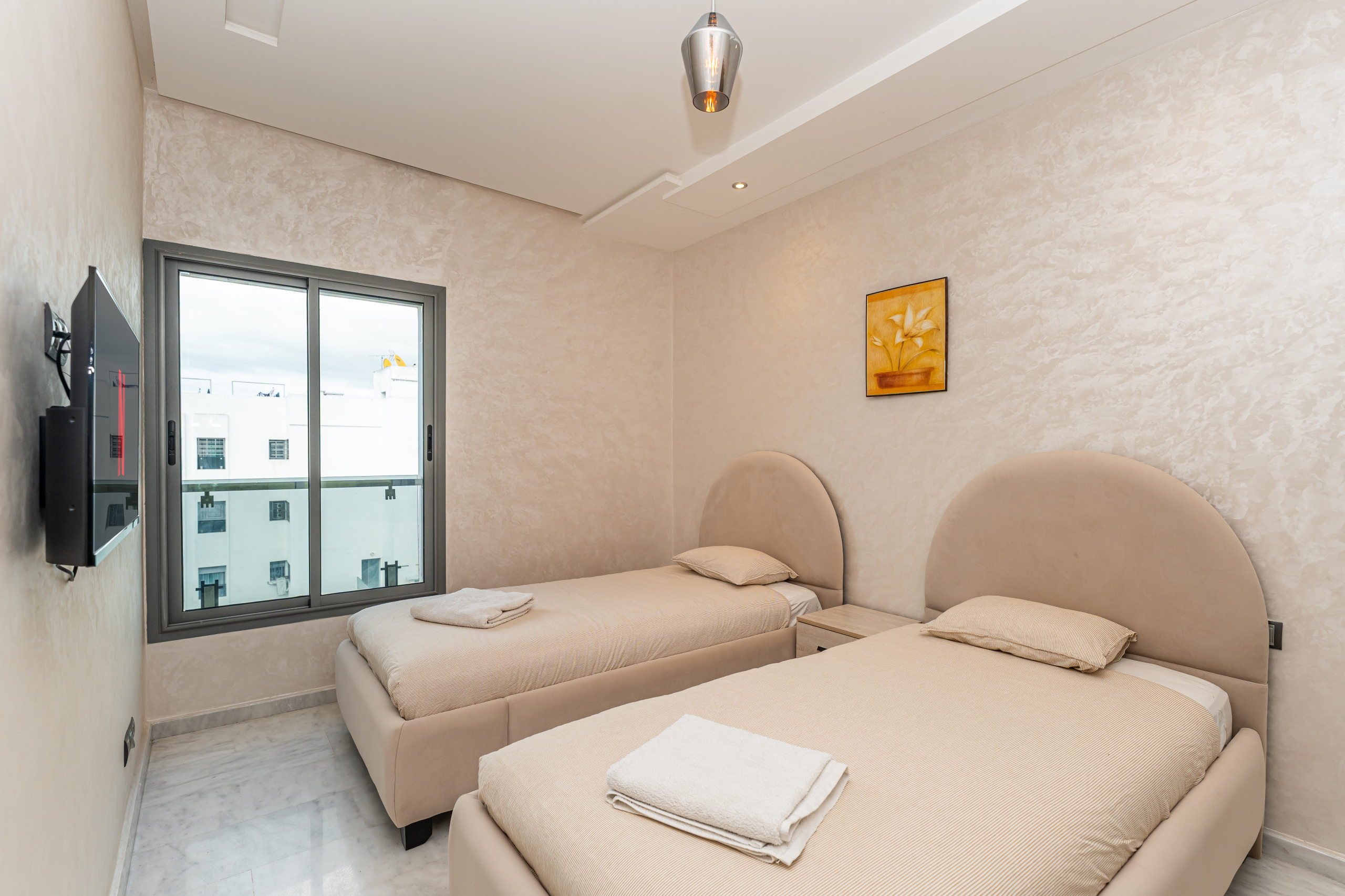 Stijlvol business-appartement — Executive Terrace, Tanger — 105m², 3slk, ondergrondse privé parkeerplaats