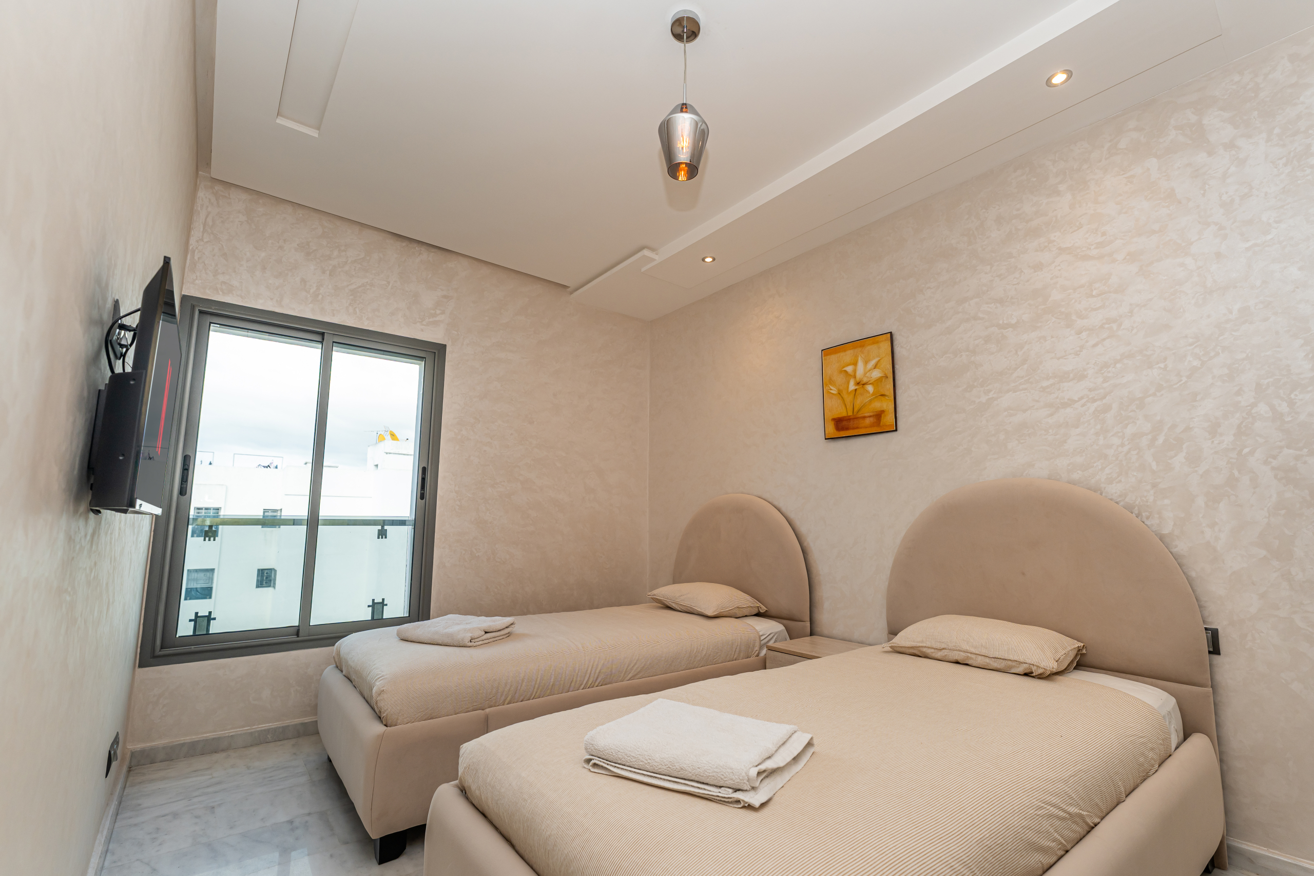 Stijlvol business-appartement — Executive Terrace, Tanger — 105m², 3slk, ondergrondse privé parkeerplaats