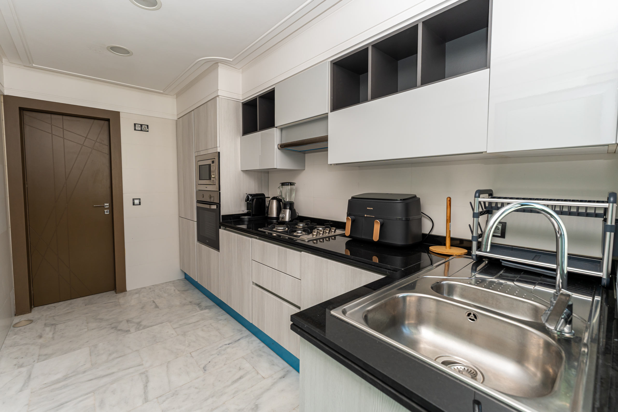 Stijlvol business-appartement — Executive Terrace, Tanger — 105m², 3slk, ondergrondse privé parkeerplaats
